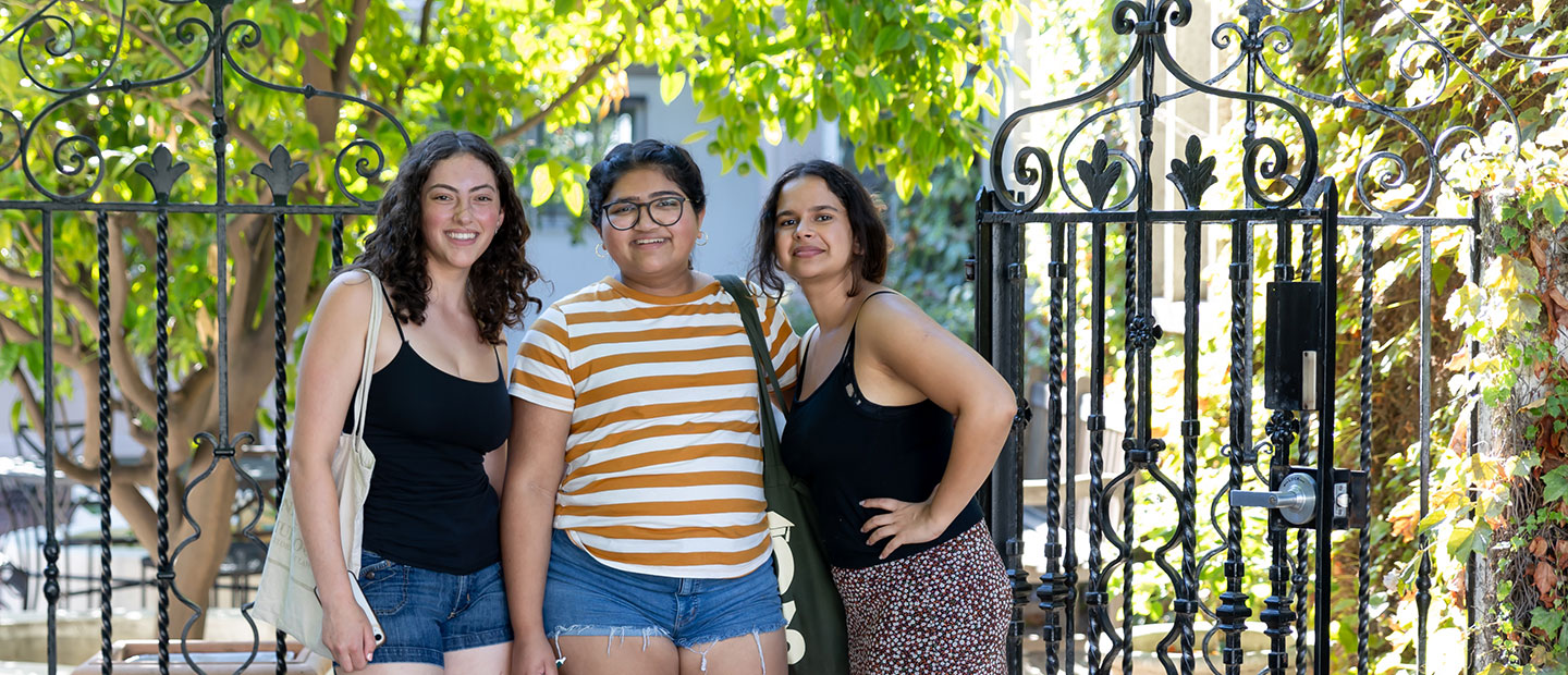 Scripps - Academic - Diversity Inclusion - Students posing in front of a wrought iron gate